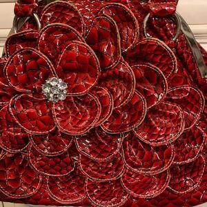 Beautiful red handbag with stones
